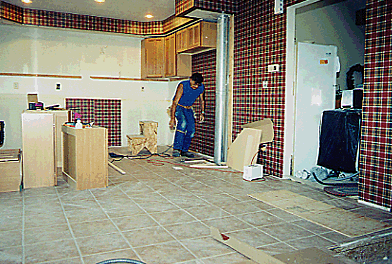The cabinet installation was next. You can see at the right how we had a temporary kitchen in the dining room. 